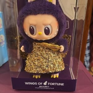 Wings of Fortune Purple and Gold Coffee Table Book